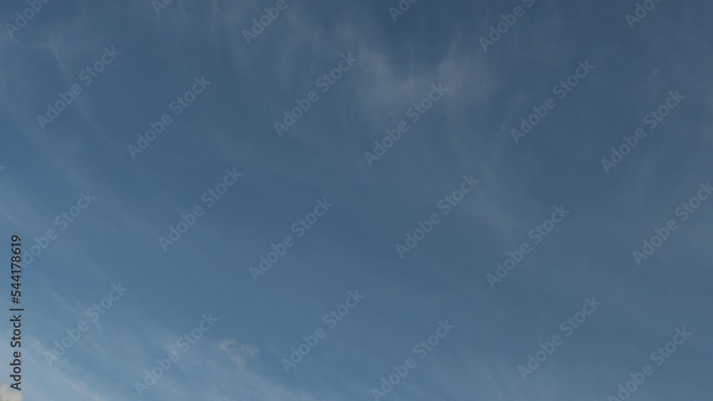 Light as feathers cirrus clouds 4K timelapse, moving across the blue sky Light as feathers cirrus clouds 4K timelapse, moving across the blue sky