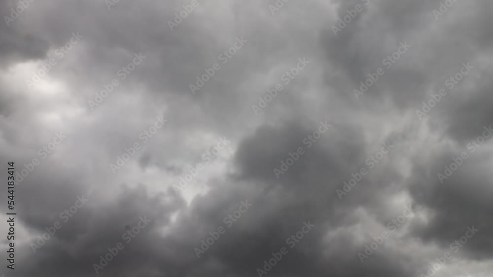 Timelapse 4K of rolling dark grey cumulus clouds before the storm Timelapse 4K of rolling dark grey cumulus clouds before the storm