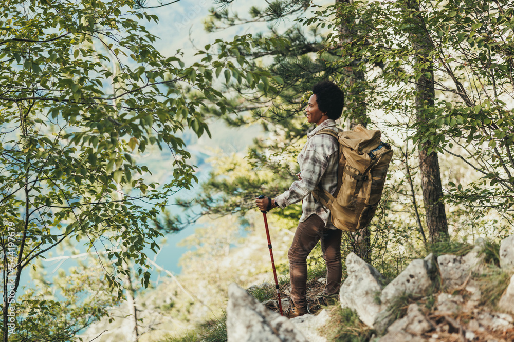 Fototapeta premium The Woman Enjoys Nature