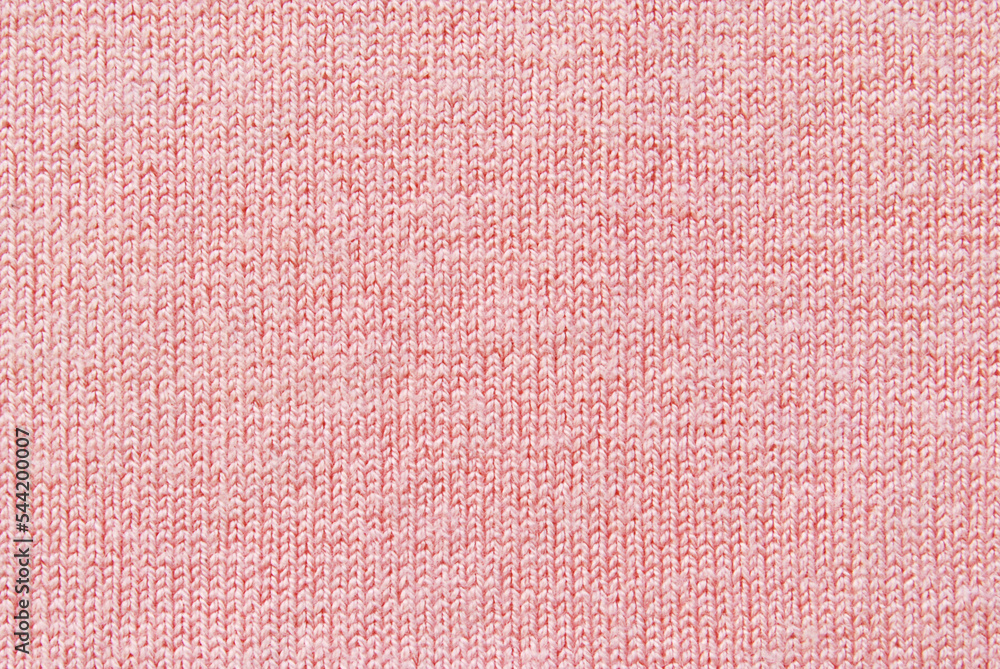 Fototapeta premium Light pink soft jersey fabric pattern texture as background 