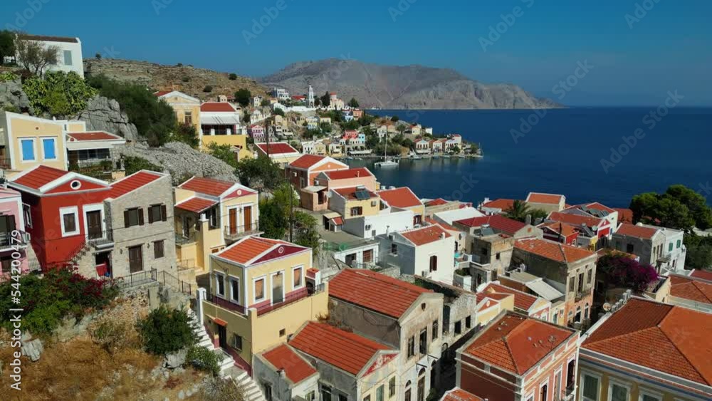 Symi is a Greek island, part of the Dodecanese island group. It’s known for its beaches, an annual music festival and for the harbor at Symi Town, surrounded by colorful neoclassical houses. Symi is a Greek island, part of the Dodecanese island group. It’s known for its beaches, an annual music festival and for the harbor at Symi Town, surrounded by colorful neoclassical houses.