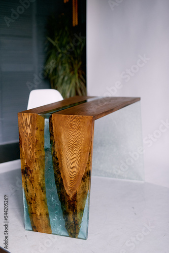 table made of epoxy resin and wood. Slabs photo