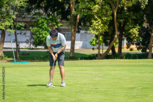 Golfer playing golf sport in golf course  © Torychemistry