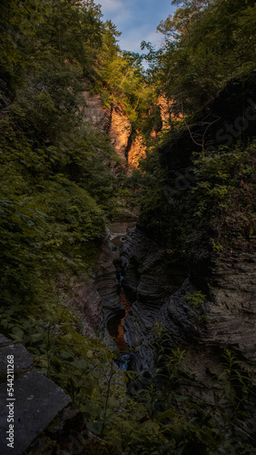 Early rays of light hitting the canyon walls during sunrise