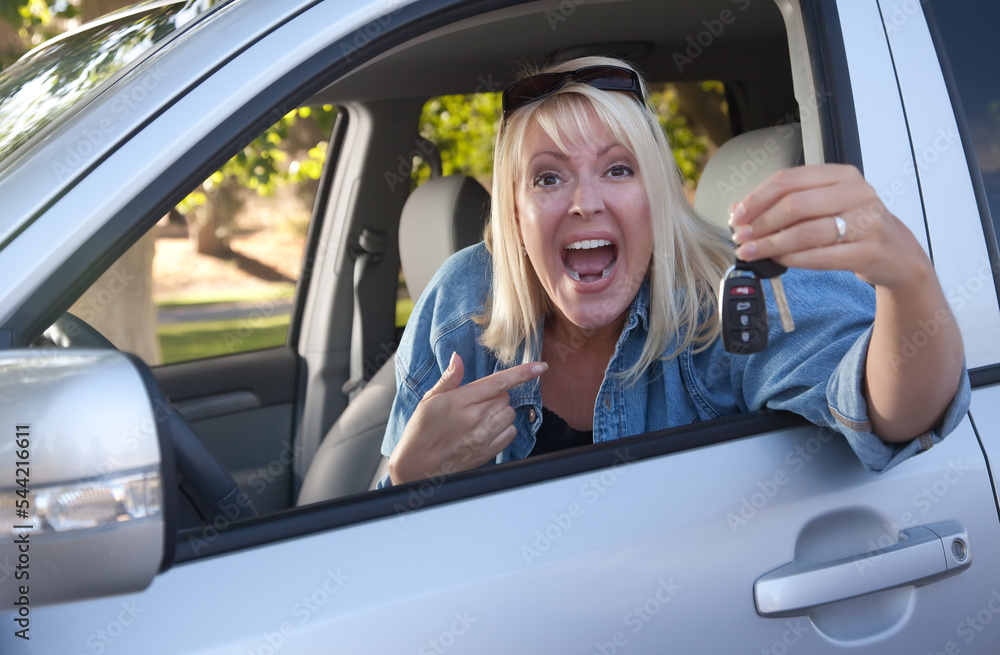 Attractive Woman In New Car with Keys Attractive Woman In New Car with Keys
