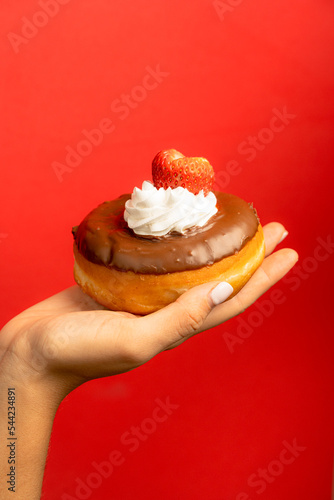 Delicious donuts with red background
