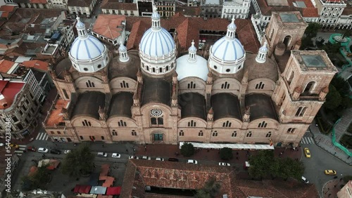 New Cathedral Domes Cuenca, Ecuador in Iconic Image of the City. Church with blue roof, drone flyover 
 photo