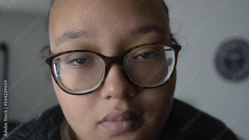 Portrait close up of a serious looking beautiful black woman. Portrait close up of a serious looking beautiful black woman.