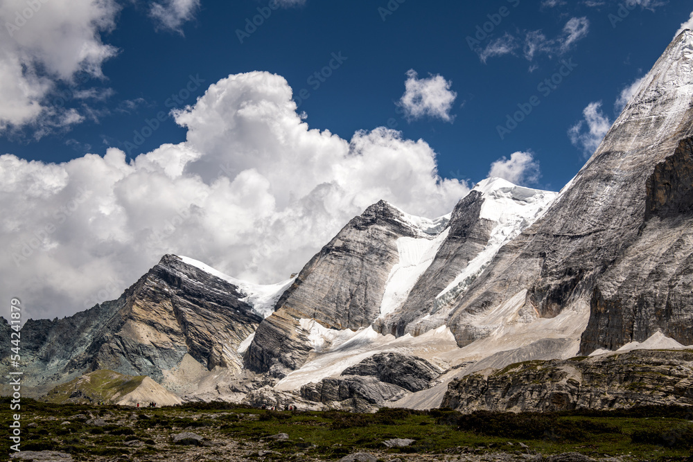 Fototapeta premium Landscape of Daocheng Yading in Western Sichuan China, Yading is surrounded by lakes, meadows and mountains. Mountains on a sunny day