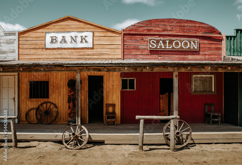 Bank and saloon facade in wild western city photo