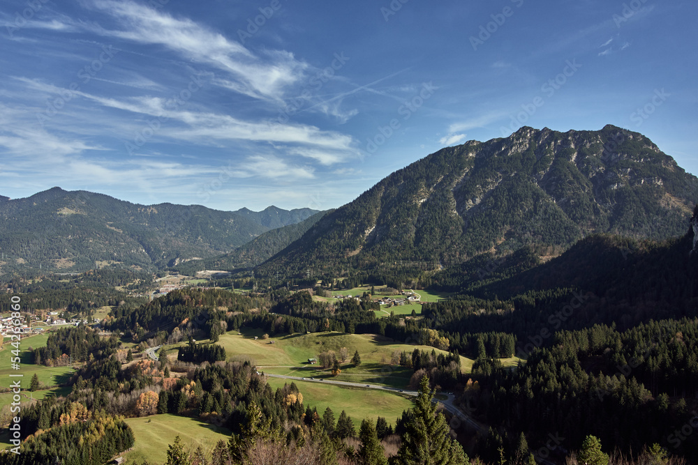 Mountain landscape and the town of Reutte on a sunny day with blue sky (view from Ehrenberg castle in Tyrol, Austria, Europe)