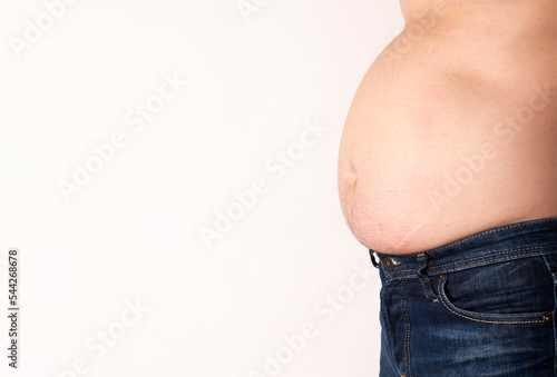 Fat man with a big belly on a white background