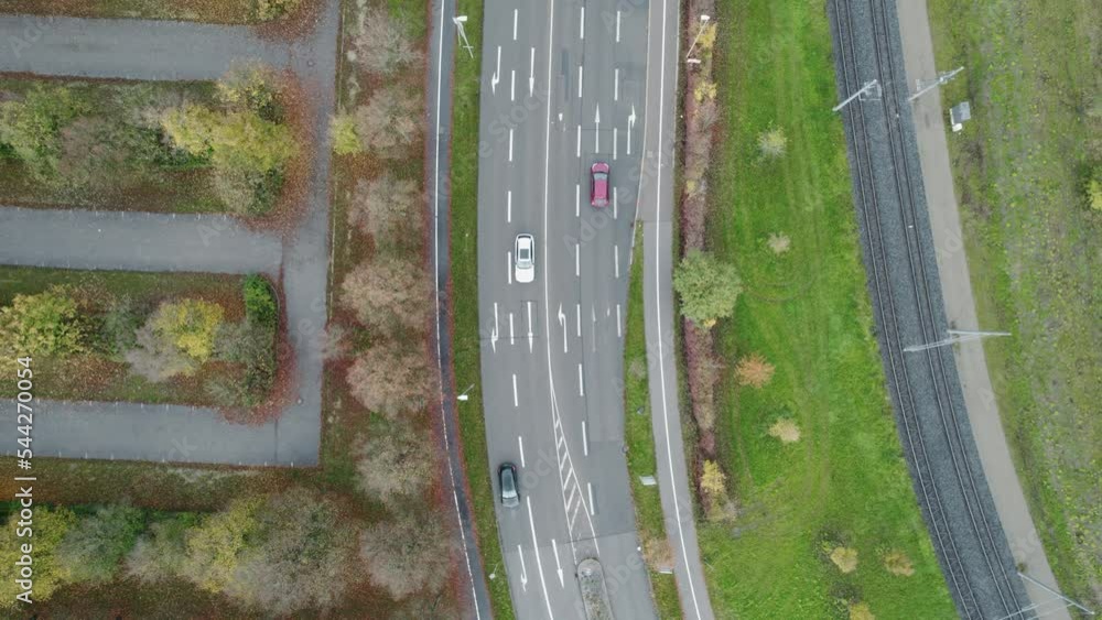 Drone Headshot of the Toll road traversed by the cars. transportation business. Drone Headshot of the Toll road traversed by the cars. transportation business.