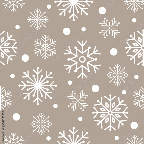 seamless pattern with snowflakes on a beige background