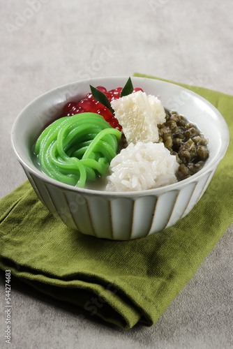 Wedang Angsle is a traditional Javanese warm dessert made of rice noodle, sago pearls, mung beans and other in ginger and coconut milk soup.