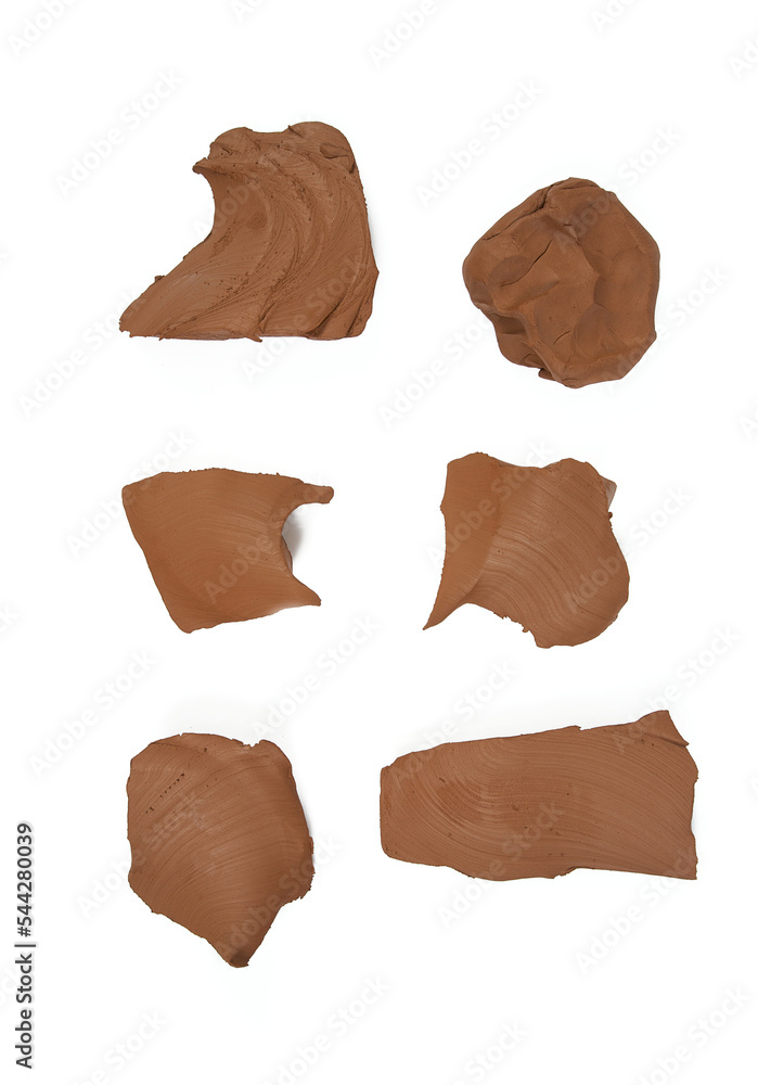 Natural clay piece isolated on white background. Wet clay material for sculpting or modeling. Natural clay piece isolated on white background. Wet clay material for sculpting or modeling.
