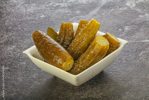 Marinated pickled cucumbers in the bowl