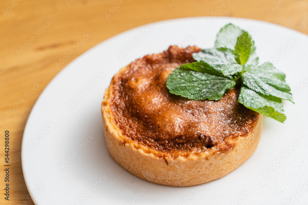 tartlets pastries with almond frangipane and powdered sugar