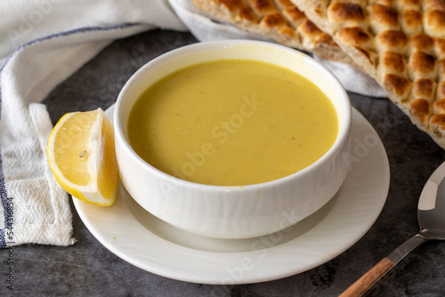 Lentil soup. Strained lentil soup on a dark background. local name suzme mercimek corbasi