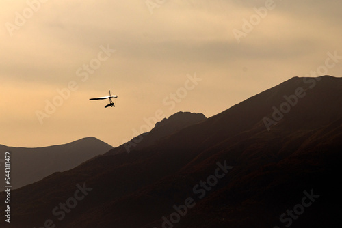 hang glider against the sky