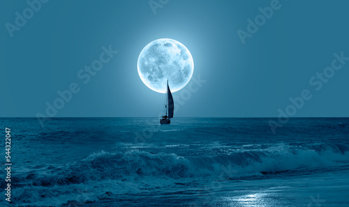 Fototapeta Naklejka Na Ścianę i Meble -  Lone yacht with Super Full Moon 