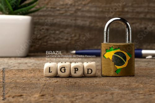 LGPD (brazilian data protection law) concept: lock with brazil flag and some die with the acronym of the Brazilian data protection law (Lei Geral de Proteção de Dados Pessoais). photo