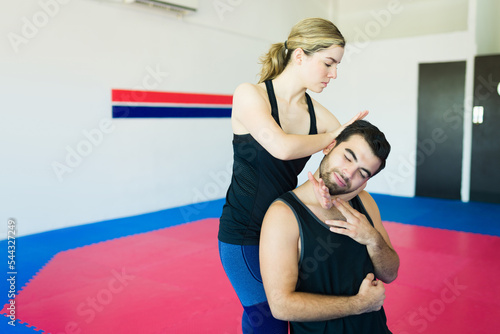 Caucasian woman practicing personal defense