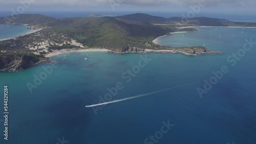 Aerial View Of Butterfish Bay Between Secret Beach And Svendsens Beach In The Keppels, QLD, Australia photo