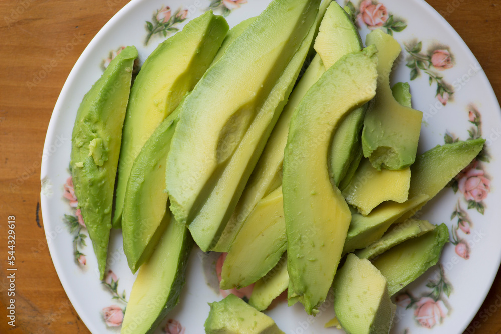 Green ripe sliced palta avocado guacamole raw fresh vegetable food Green ripe sliced palta avocado guacamole raw fresh vegetable food