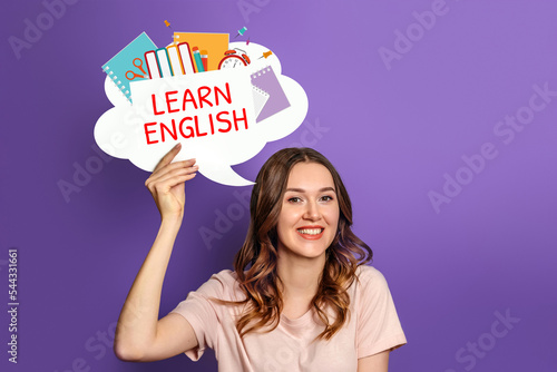 student girl holding speech bubble with text learn english and illustration isolated on lilac background