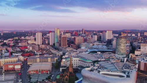 aerial view drone birmingham city downtown at dawn,flying over rotunda and bullring