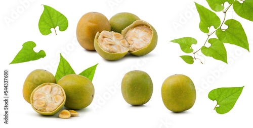 fresh ripe fructus momordicae with green leaves isolated on white. photo