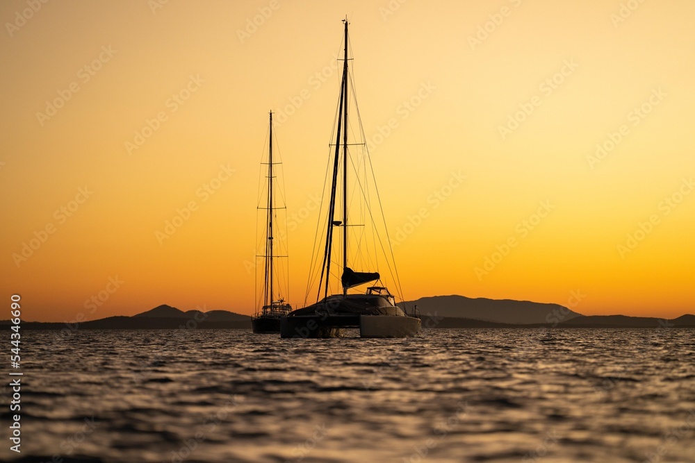 yachting on the sea in at sunset in australia
