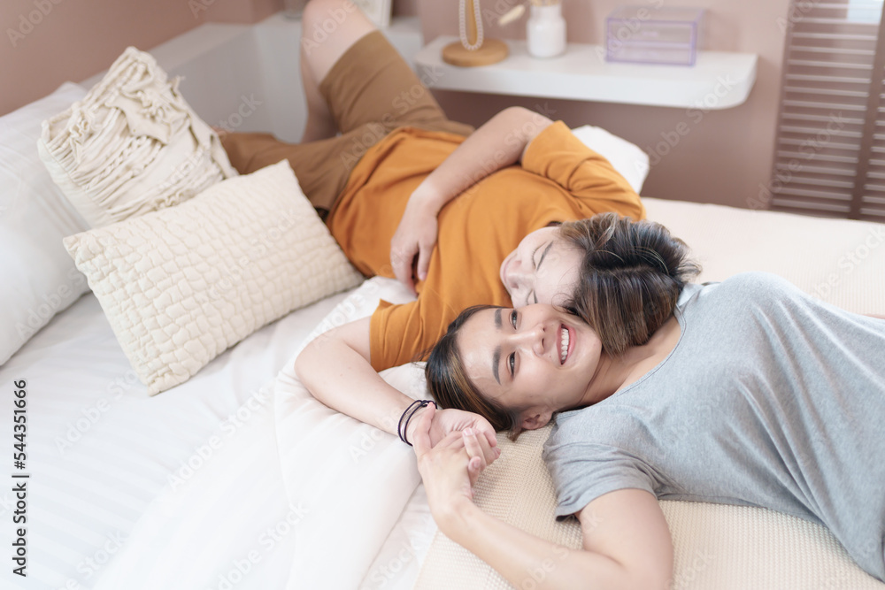 Asian lesbian couple, LGBTQ. Happy Two young Asia women showing love and romance together at home. Positive mood and moment of LGBT lesbian. Asian lesbian couple, LGBTQ. Happy Two young Asia women showing love and romance together at home. Positive mood and moment of LGBT lesbian.