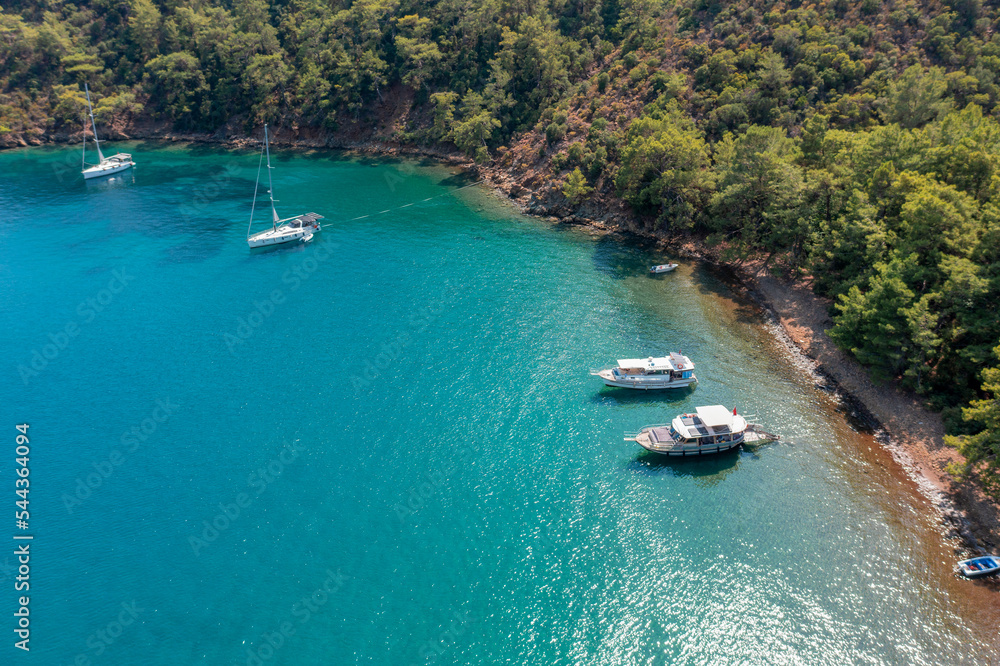 Turquoise sea and aerial view of boats at Ekincik bay. Turquoise sea and aerial view of boats at Ekincik bay.