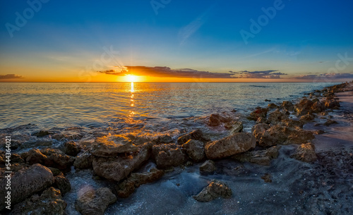 Sunset over the Gulf of Mexico from Caspersen Beach in Venice on the southwest gulf coast of Florida USA