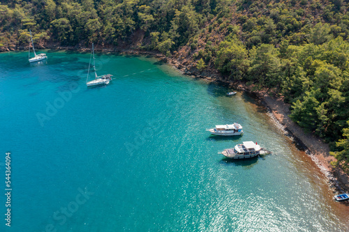 Turquoise sea and aerial view of boats at Ekincik bay.  © Yasemin