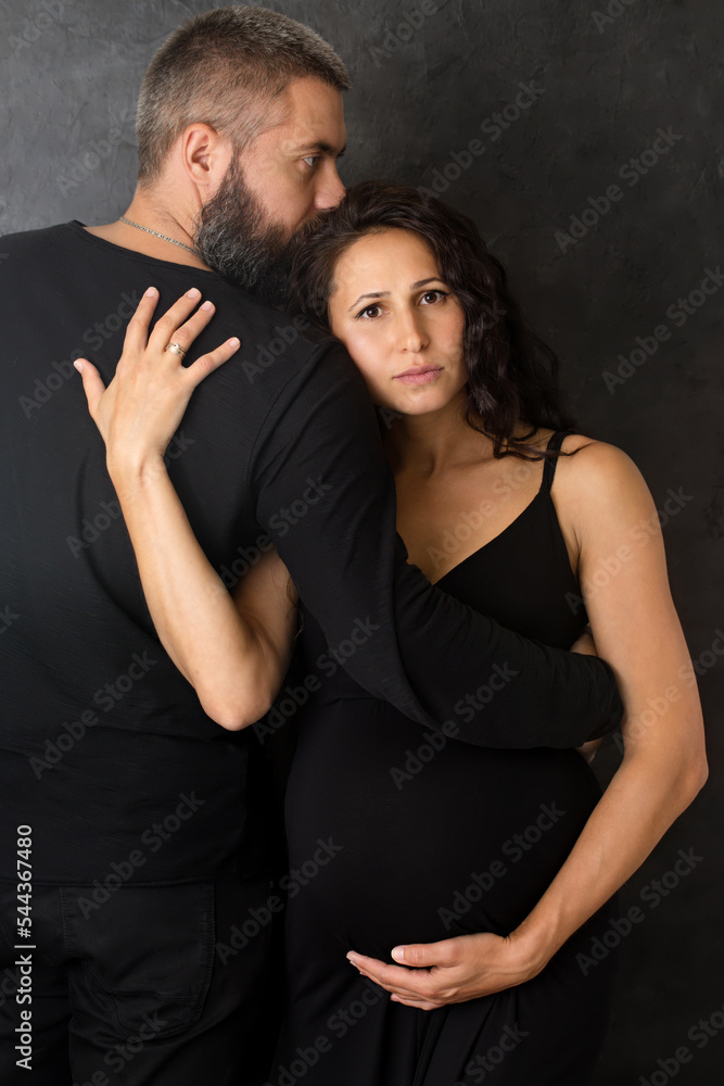 A sad pregnant woman with a man A sad pregnant woman with a man