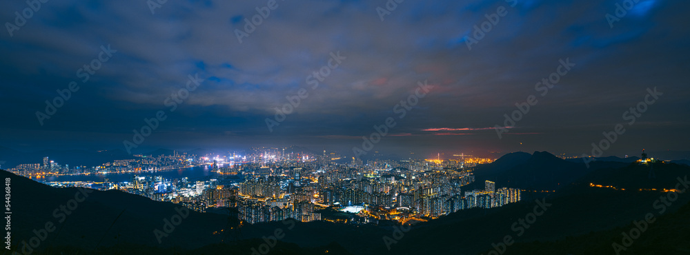 Beautiful Hong Kong skyline at night. Looking down from Kowloon Peak.