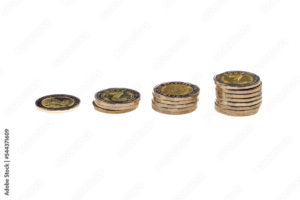 Coins stacked in piles, isolated in white. Finance concept. Coins stacked in piles, isolated in white. Finance concept.