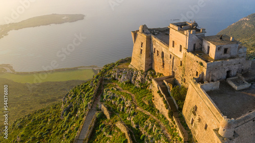 Aerial view on Santa Caterina castle located on Favignana island in Sicily, Italy. It was built on the homonymous mountain. In the background is the Tyrrhenian Sea.  photo