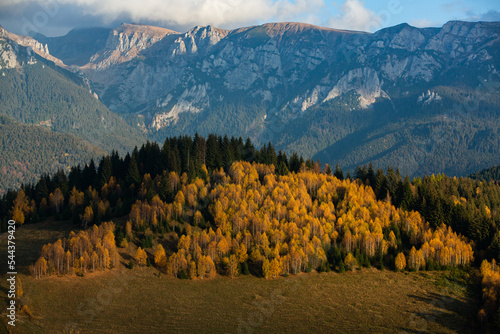 A charming mountain landscape in the Bucegi mountains, Carpathians, Romania. Autumn nature in Moeciu de Sus, Transylvania