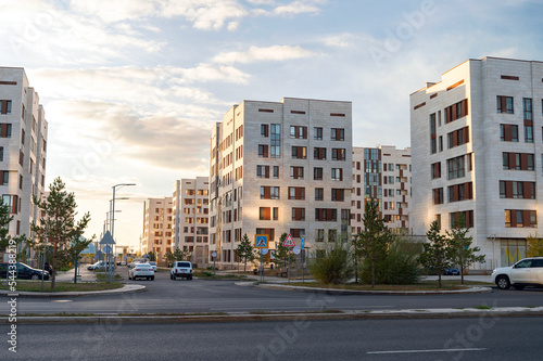 Cityscape of a residential area with modern apartment buildings © grthirteen