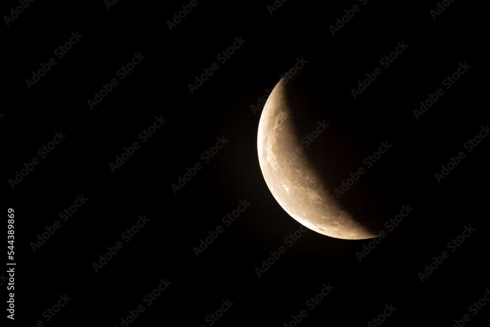 The partial lunar eclipse is caused by the earth moving between the sun ...