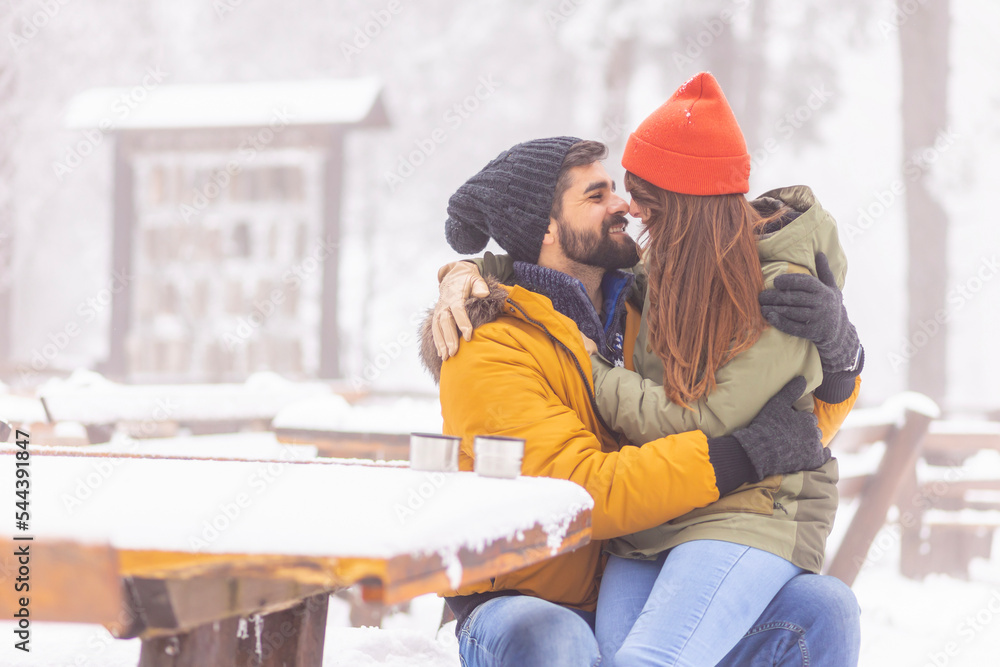 Couple on winter vacation in the mountains Couple on winter vacation in the mountains