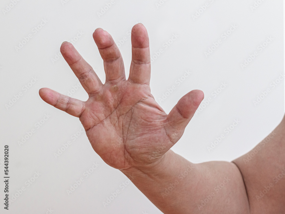 An open man's palm on a light background An open man's palm on a light background