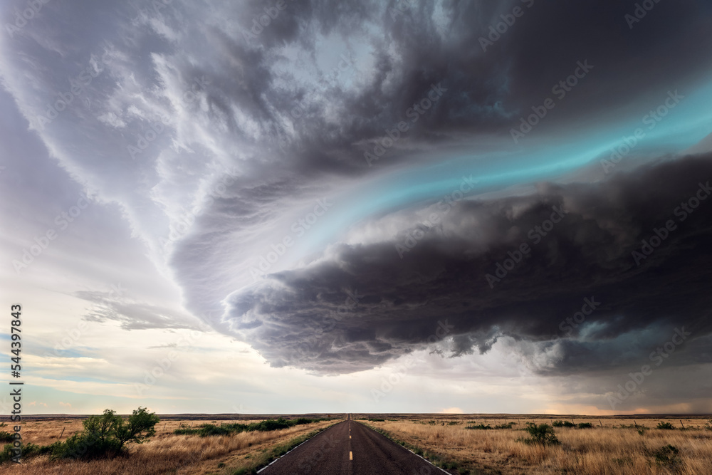 storm clouds over a road
