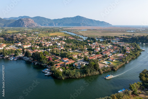 Aerial view of Dalyan river and boats with Iztuzu Beach Scenery, Turkey.