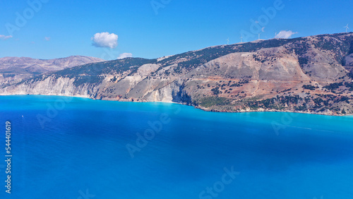 Aerial drone photo of beratiful secluded beaches near fishing village of Assos accessible only by boat, Kefalonia island, Ionian, Greece