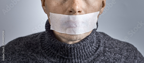 Obraz na płótnie Man silenced with duct tape over his mouth
